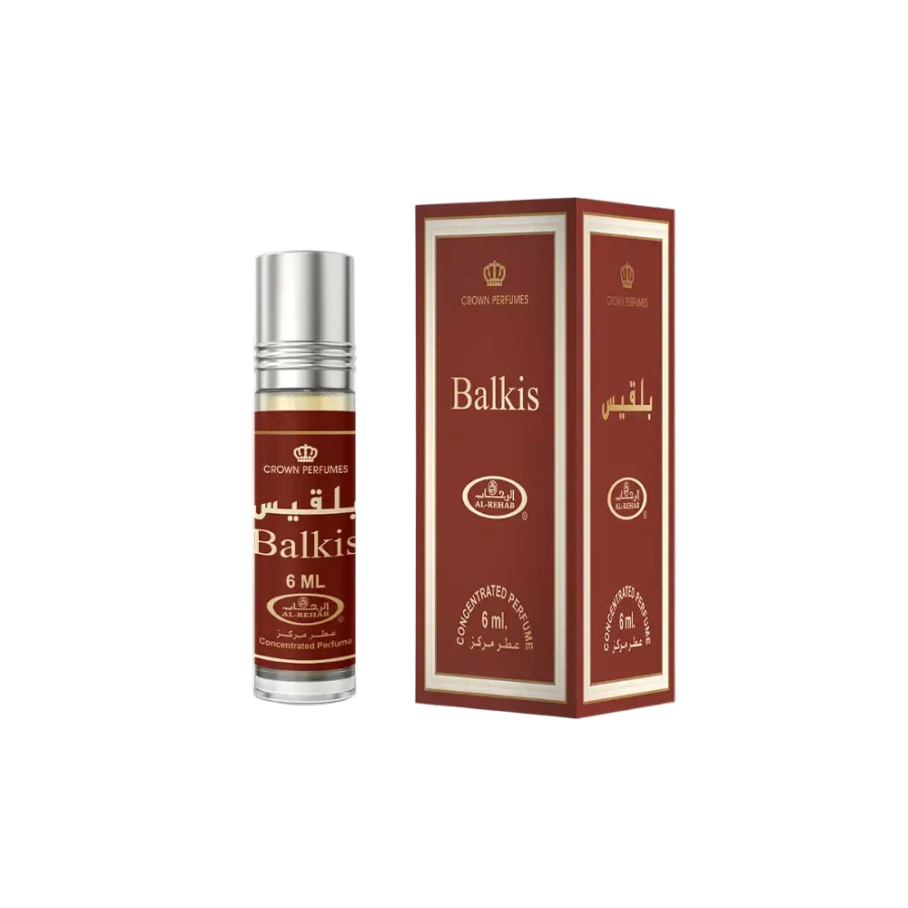 A sleek 6 ml concentrated perfume oil roll-on with silver cap and maroon label beside its matching branded box