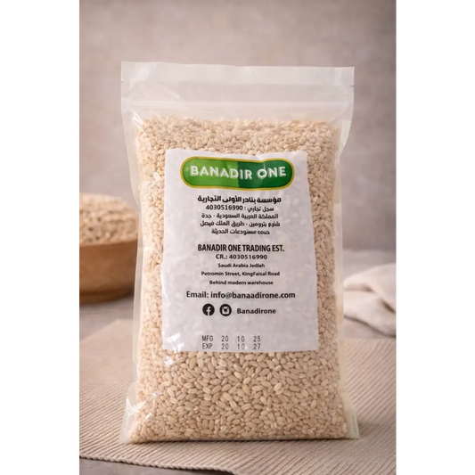 A clear plastic bag of light beige premium quality pearl barley 500g labeled banadir one natural grains