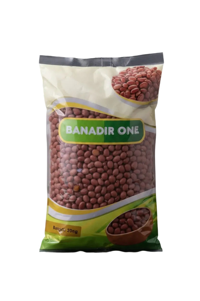 A bowl of premium quality red beans 500g garnished with parsley beside couscous salad in white ceramic bowls