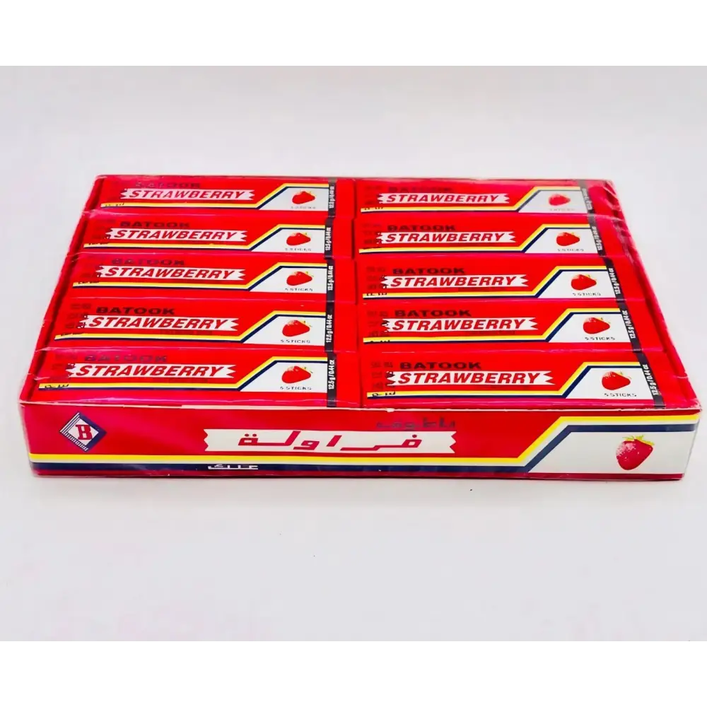 Red and white cardboard box of batook strawberry chewing gum with strawberry flavour and arabic text logo