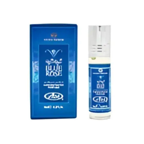 Blue rose concentrated perfume oil in a sleek transparent glass rollerball bottle with silver cap and blue packaging by Al Rehab