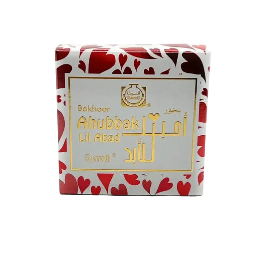 Red and white heart pattern box of bukhoor ahubbak lil abad 40g by surrati for aromatic fragrance use