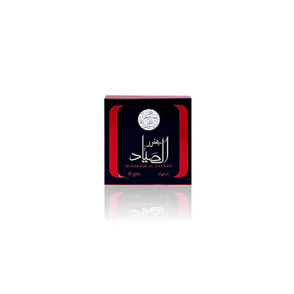 Black and red square box of bukhoor al sayaad 40g perfume by ard al zaafaran featuring silver arabic script and emblem