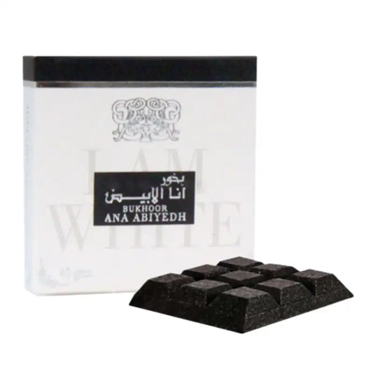 Black rectangularly segmented bukhoor ana abiyedh incense blocks with white musk scent by Lattafa 40g