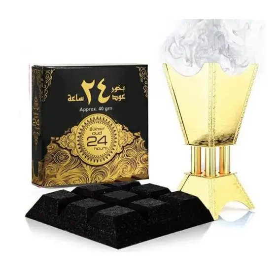 Gold-colored ornate incense burner with smoke rising for bukhoor oud 24 hours 40g by ard al zaafaran noor east