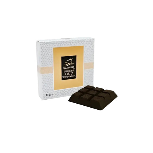 Dark brown rectangularly segmented incense block of bukhoor oud romancea by ard al zaafaran for fragrant use