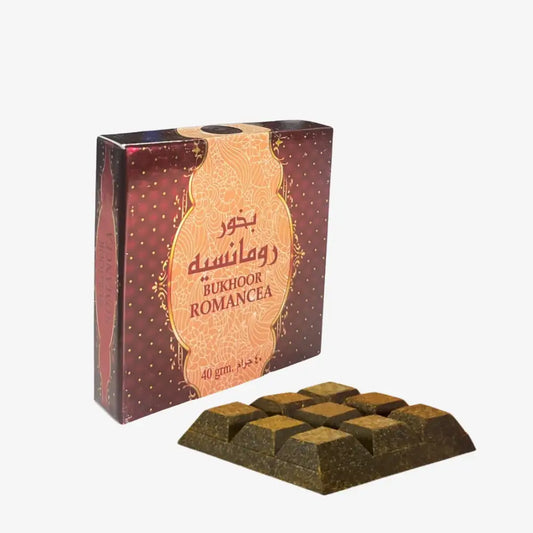 A dark green rectangularly segmented bukhoor romancea incense block with a textured surface by ard al zaafaran