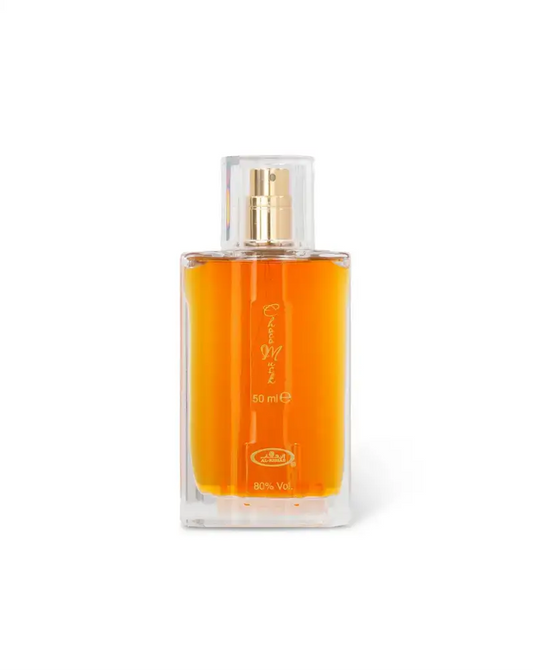 Perfume bottle with orange liquid on a white background