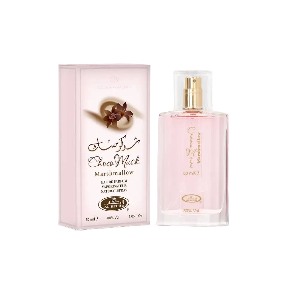 Pink glass perfume bottle with gold spray nozzle and matching pink box labeled choco musk marshmallow by al rehab
