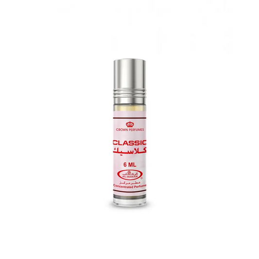 A sleek silver roll-on concentrated perfume oil bottle with a white label and red crown perfumes branding 6 ml