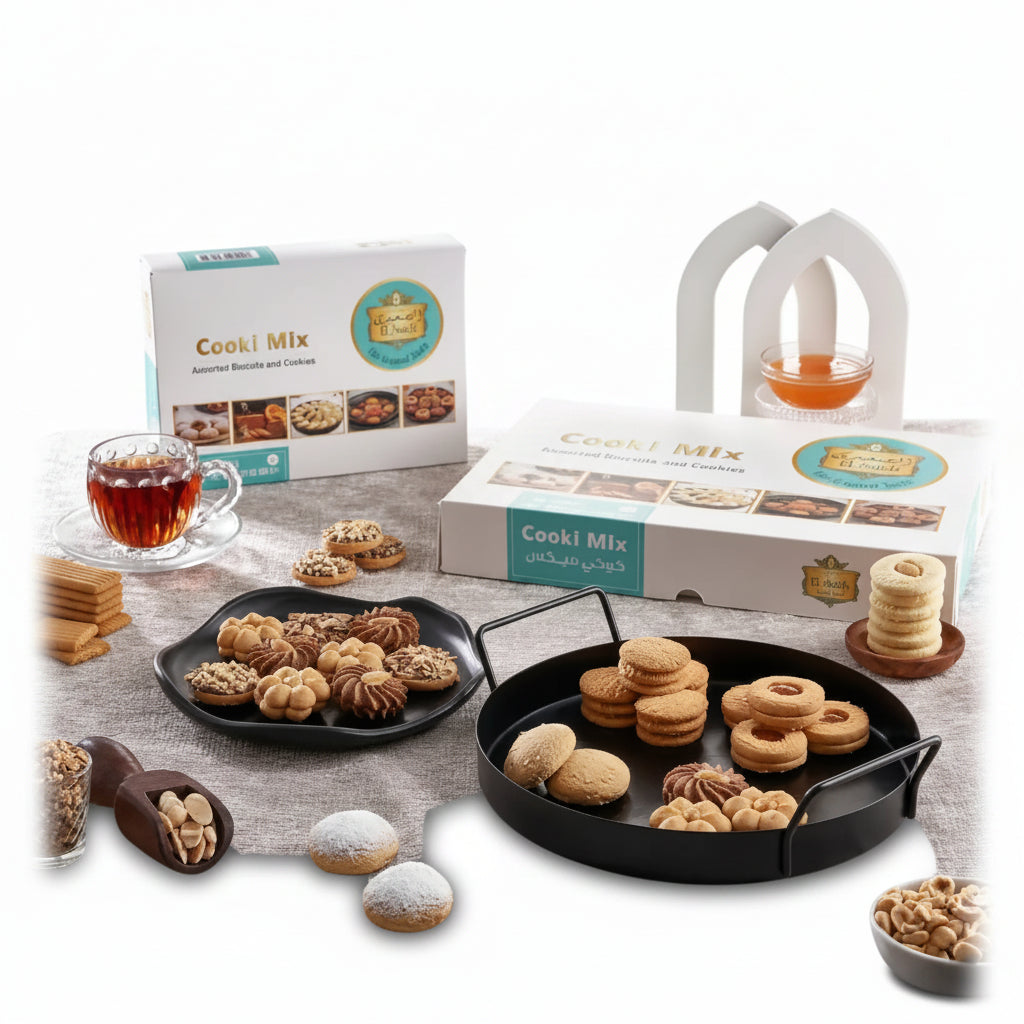 Assorted golden-brown and chocolate middle eastern cookies displayed on black trays from el saidy cookie mix 1900g