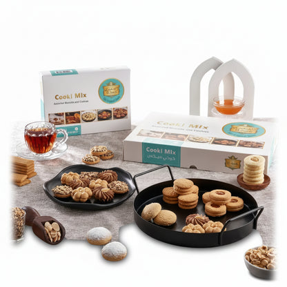 Assorted golden-brown and chocolate middle eastern cookies displayed on black trays from el saidy cookie mix 1900g