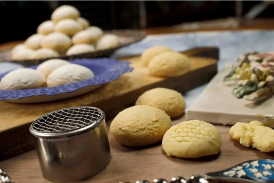 A silver metal cookie press with a fine mesh top for making authentic 500g egyptian cookies el saidy kahk with dates