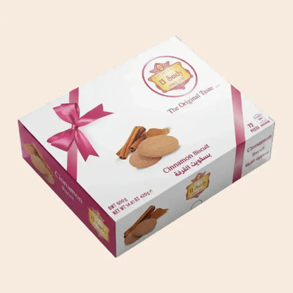 Cinnamon biscuit box with pink ribbon and branding on a white background