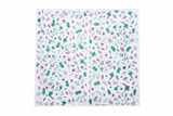 White square scarf with green and pink floral motifs shown with elite disposable table sheets sufra roll for food serving