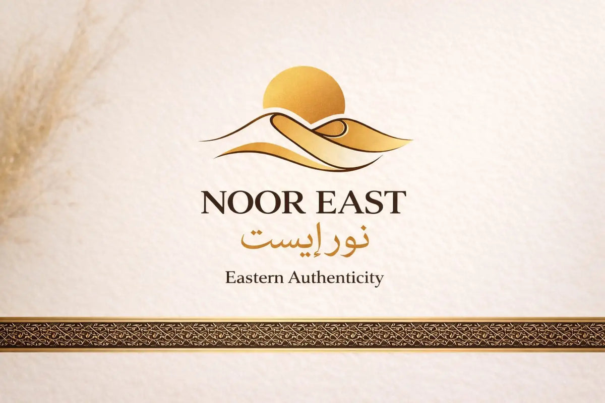 Golden logo featuring stylized mountains and a sun, with the text ’noor east’ in dark brown serif font above arabic script.