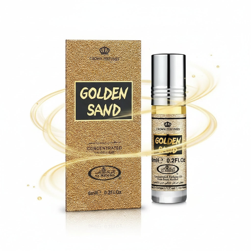 Golden sand concentrated perfume oil in a silver rollerball with gold liquid and ornate textured gold box packaging