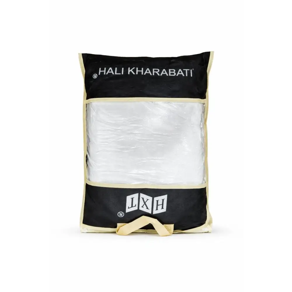 Black and cream fabric umrah complete essentials bag with clear window showing white crinkled ihram cloth and activity book