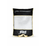 Black and cream fabric umrah complete essentials bag with clear window showing white crinkled ihram cloth and activity book