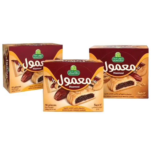 Maroon and gold cardboard boxes of halawani bros maamoul cookies filled with dates in whole wheat and classic varieties