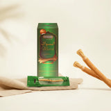 HEMANI Miswak packaging with toothbrushes on a light green background