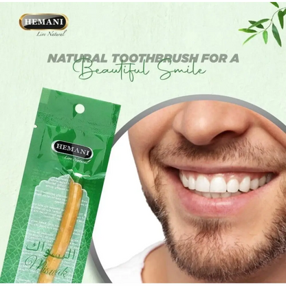 Hemani natural toothbrush packaging with a close-up of a smiling person's mouth.