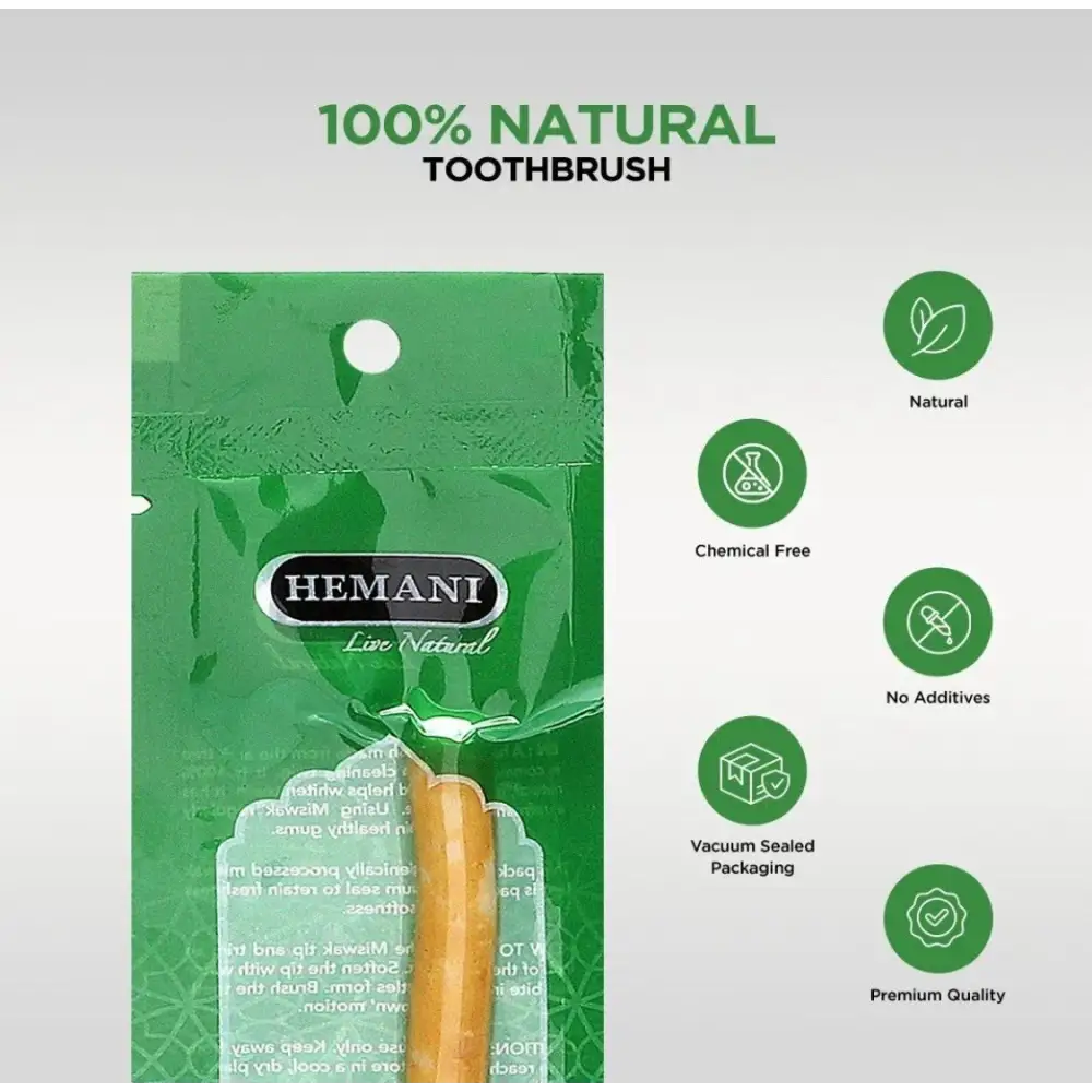 Green package of HEMANI 100% natural toothbrush with product details on a white background