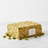 Al Jameel Pistachio Halva 500g – golden sesame halva block with real pistachio pieces on white background