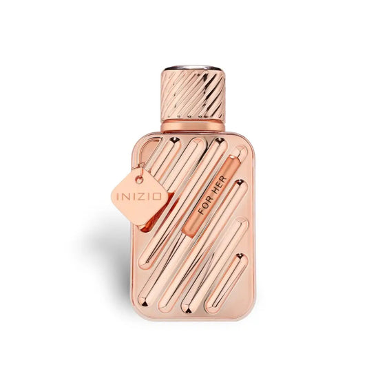 Rose gold inizio for her eau de parfum bottle with textured cap and geometric design from fragrance world 100ml