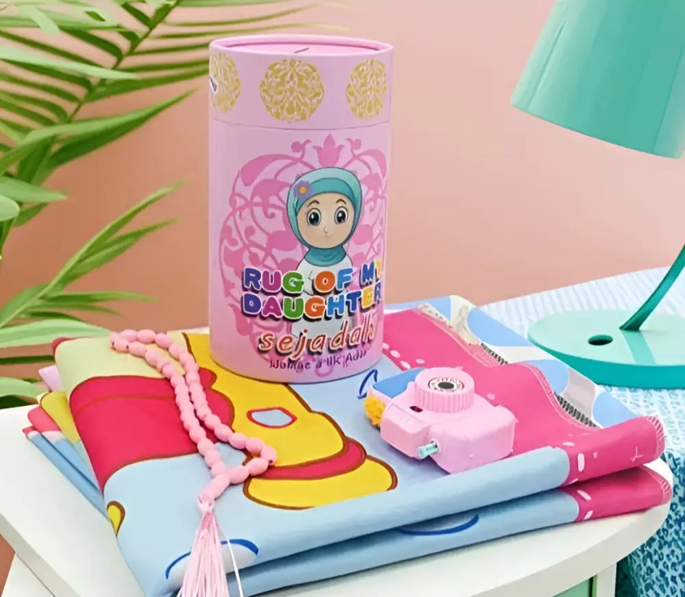 Pink cylindrical small prayer mat with gold foil and cartoon design featuring rug of my daughter for kids prayer rug set