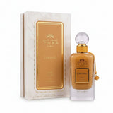 A golden-hued rectangular glass perfume bottle with a clear spherical cap for ithra dubai musk caramel eau de parfum