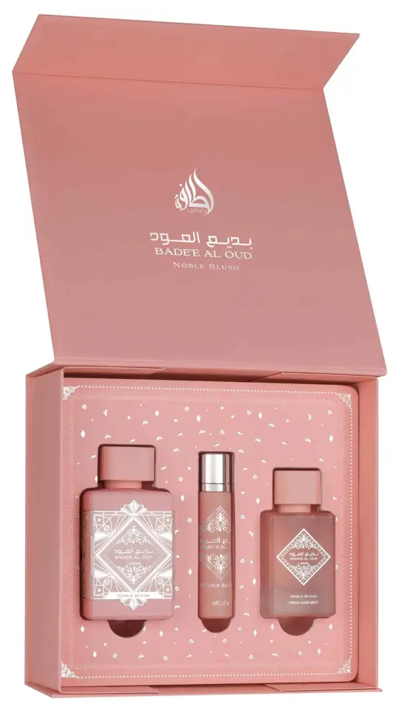 Babyl Al Oud perfume set with three bottles in a pink box on a white background