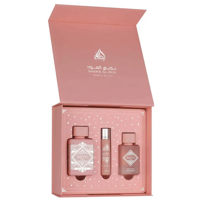 Babyl Al Oud perfume set with three bottles in a pink box on a white background
