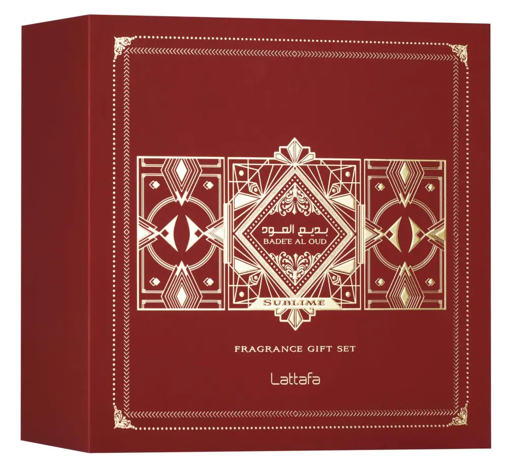 Deep red lattafa gift set box with gold patterns for badee al oud sublime 100ml edp hair mist and 12ml bottle