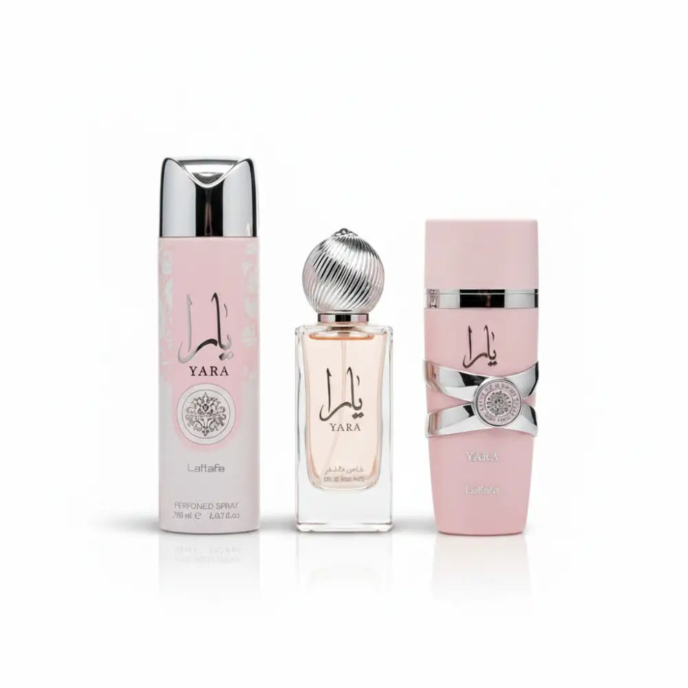 Set of three Yara perfume bottles on a pink background with brand logo.
