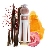 Perfume bottle with vanilla beans, rose, and amber on a white background