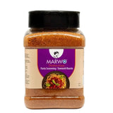 Marwo xawaash authentic somali spice in a clear jar with black lid containing orange-red powder for somali rice and pasta