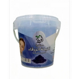 A clear plastic bucket with white lid of al-awla black charcoal powder for skin care in moroccan blue nila soap set