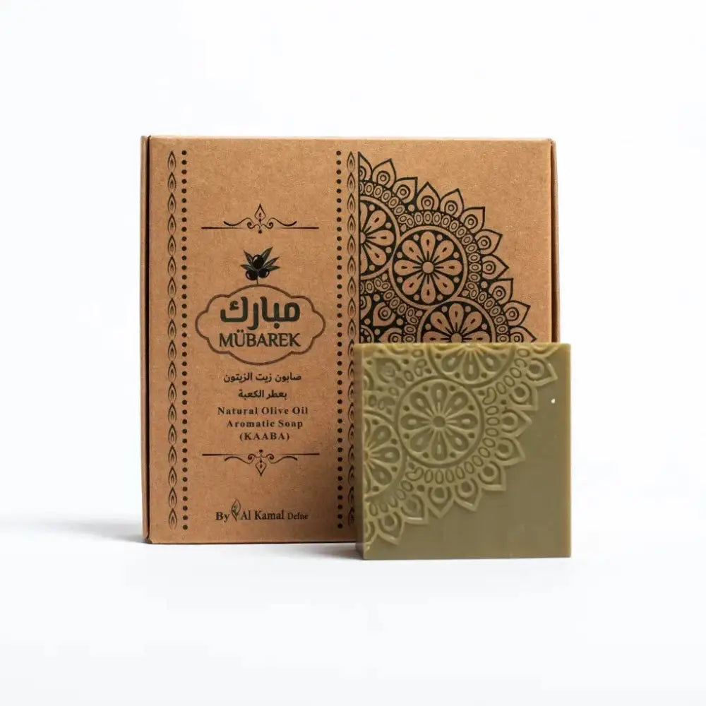Olive green soap bar with embossed mandala design in kraft box labeled mübarek natural olive oil aromatic soap kaba
