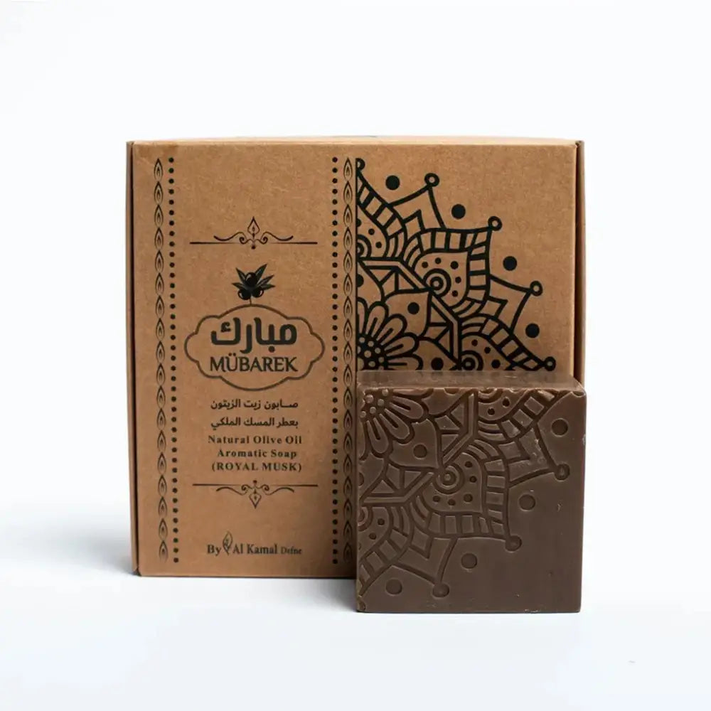 Brown rectangular bar of mübarek natural olive oil aromatic soap royal musk with embossed mandala and matching packaging