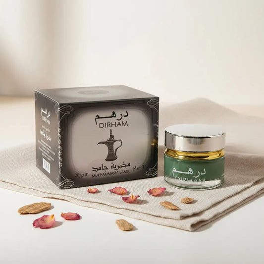 Dirham perfume bottle with packaging on a white background