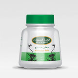 A white plastic jar with a green lid containing natural massage rub black seed cream 100 ml by al-helal