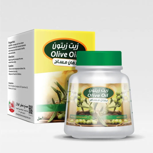 White plastic bottle with green cap labeled natural massage rub olive oil cream al-helal featuring olive branches and arabic text