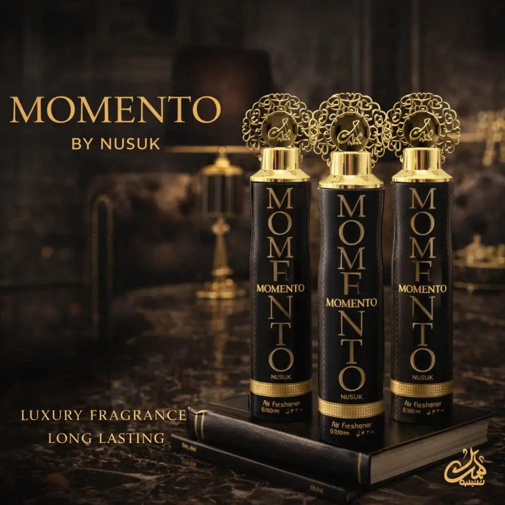 Momento by Nusuk luxury fragrance bottles on a dark background