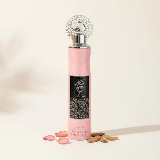 Pink air freshener with silver top on a white background