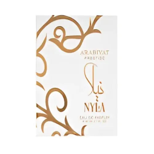 A white and gold ornate perfume bottle labeled sis and nyla for arabiyat prestige nyla fresh citrus nyla edp 80ml