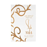 A white and gold ornate perfume bottle labeled sis and nyla for arabiyat prestige nyla fresh citrus nyla edp 80ml