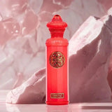 A vibrant red omniyat eau de parfum 140ml surrati heritage bottle with gold ornamental medallion and embossed brand name