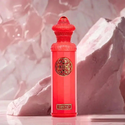 A vibrant red omniyat eau de parfum 140ml surrati heritage bottle with gold ornamental medallion and embossed brand name