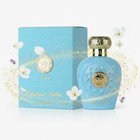Light blue opulent dubai eau de parfum bottle with gold accents and embossed design featuring heart notes unisex fragrance